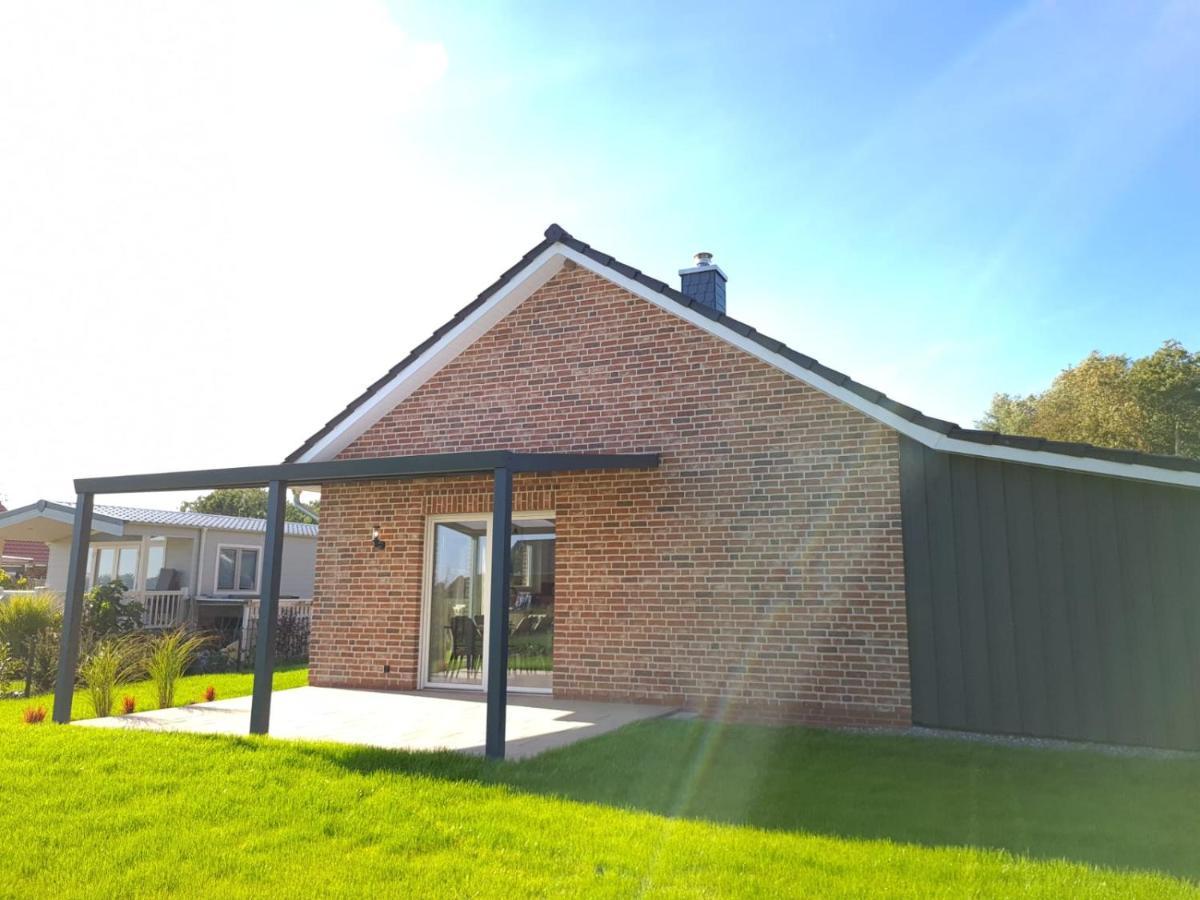 Haus Kuestenbrise - Urlaub Mit Hund An Der Kueste Mit Eigenen Garten, Sauna Und Gemuetlichen Kaminfeuer Schweiburg Exterior photo